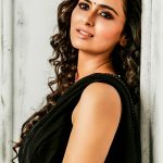 Meenakshi Dixit, black saree, glamour