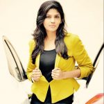 Niranjani Ahathian (31) yellow coat jacket black dress modern