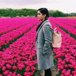 sanya malhotra  pink rose garden background pic. tulips garden with grey overcoat(24)