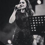 Andrea Jeremiah, black, stage, singer