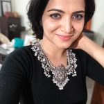 Dhivyadharshini, black dress