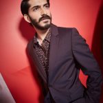 Harshavardhan kapoor brown overcoat designer shirt and red background(15)