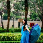 ramya at park  in blue saree and blue umbrella park