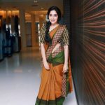 ramya at sathyam cinemas in brown and green designer saree