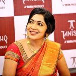 ramya vj candid pic at opening of tanishq showroom red and golden saree traditional look jewellery