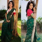 ramya vj in green designer saree with colored blouse in garden