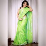 ramya vj in light green saree posing black blouse