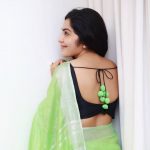 ramya vj in light green saree posing black blouse back pose