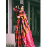 ramya vj with checked pink rose black and yellow silk saree jasmine flowers and a diamond necklace