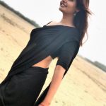 Ashima Narwal, black saree, hip, side view