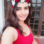 Ashima Narwal, red inner, smile