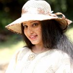 Malavika Menon, cap, smile