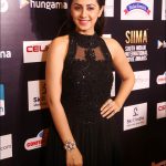 Nikki Galrani, black dress, function