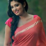 Veena Nandakumar, red saree, favorable