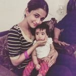 anaika soti photo with cute child black top white striped tee (7)