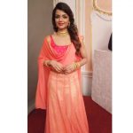 Ashna Zaveri, orange dress