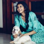 Kalyani Priyadarshan, pet, dog, playing