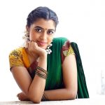 Lovelyn Chandrasekhar, green half saree