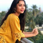 Suza Kumar, face, casual, yellow dress