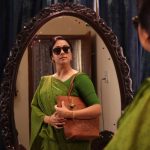 Kaatrin Mozhi, Jyothika, green saree, coolers, mirroe