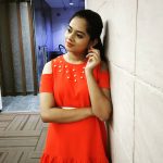 Anitha Sampath, former news anchor, modern dress, orange dress, classy