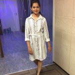 Anitha Sampath, voice over artist, white dress, sun tv