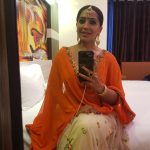 Meghna Naidu, Dharma Prabhu Heroine, orange dress
