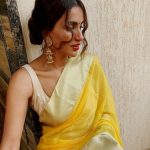 Akshara Gowda, Panchatantra Heroine, yellow saree, side pose