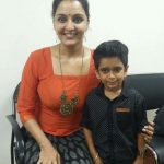 Manju Warrier, Asuran Heroine, orange dress, kid