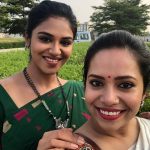 Indhuja Ravichandran, charming, grass, green saree