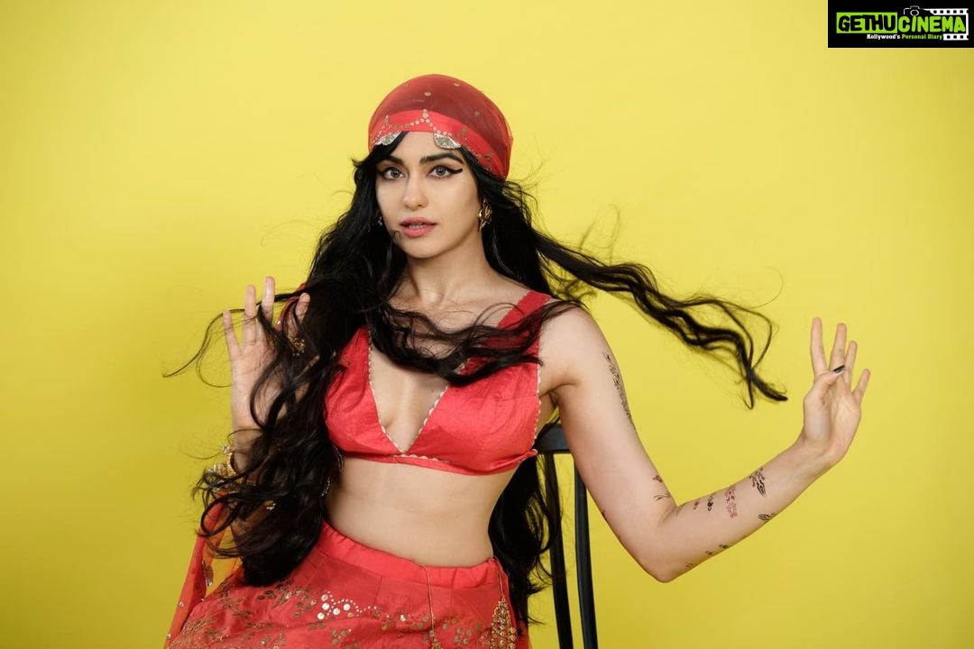 Adah Sharma Instagram - Hold my gun 🙃🤫 SWIPE at your own risk Shooting 6 killer festive looks for the cover of @lutopiamagazine this month 👊❣️ . . Editor: Aparajita Jaiswal @davis_griffo Photographer: Rahul Kumar @thewildstallion_photography n_photo Stylist - Juhi A Ali @juhi.ali HMU - Vaijayanti talekar @vaijayanti_12 Anant mali @_makeup__andy Assistant photographer: Nikhil Bapu Ahire @mr.nee_khill Photo editor: Harry Sandhu @hqbe_retouch Artists pr - @shimmerentertainment @lathiwalatasneem @namita_rajhans_ @akshatamanikpurkar Location - studio f6 @studio.f6 Lehenga set - Etasha by Asha Jain @etashabyashajain Earrings and haath kada by - blue turban @blueturban.in and Rubans @rubansaccessories Kamar piece by - Rubans accessories (@rubansaccrssories) . . #100YearsOfAdahSharma #adahsharma #covergirl