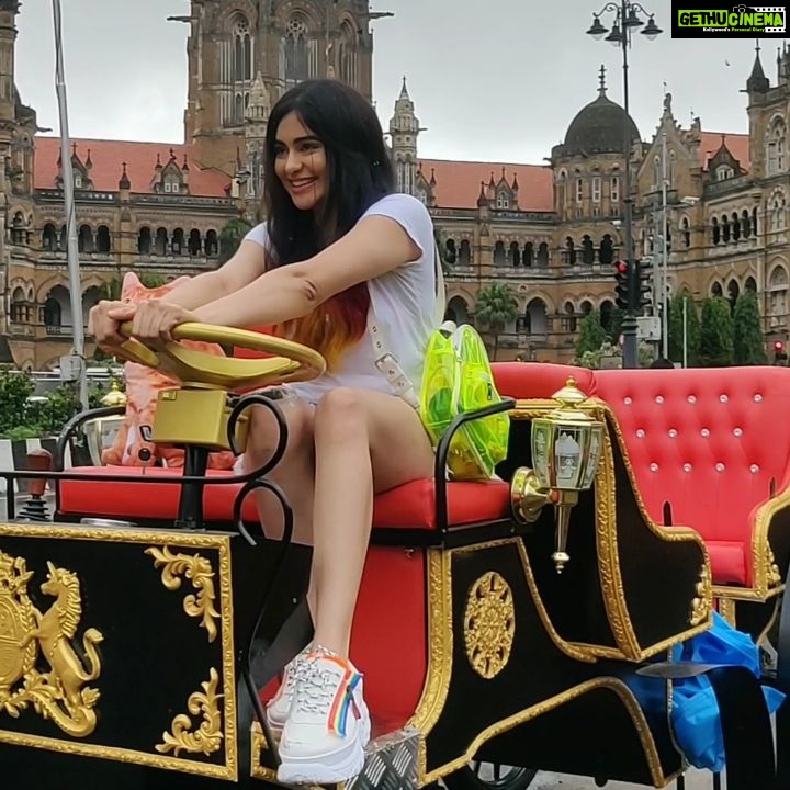 Adah Sharma Instagram - Who wants to go for a drive ? Tag a friend who you'd take on this ! . The E Victoria's are being launched on 1st September !!! . . Where to ? Now i only have to find a Leonardo Dicaprio type human (like him from The Titanic) to ask me and then i can say to the stars !!! . . My Star kid Radha Sharma @adah_ki_radha gets a free ride on the first E Victoria ! My humble daughter is sitting in the rain without complaining also !! So kind hearted 🥰