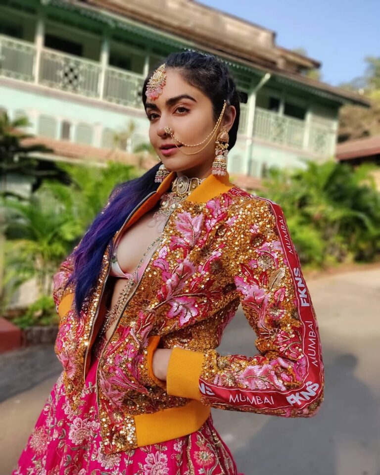 Adah Sharma Instagram - Poll : Do you love this look ? YES OR YESSSSS 😁😁😁😁 . . Decided to have some fun for the red carpet of @hellomagindia #hhof19 #hellohalloffame Bomber jacket with a lehenga and a nath 🤗🙆❤️ . Bomber - @narendrakumarahmed Lehenga- @kalkifashion Accessories - @kohar_jewellery . . . Styled by- @juhi.ali Hmu- @snehal_uk