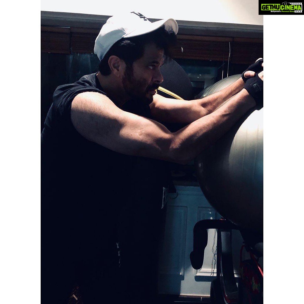 Anil Kapoor Instagram - It’s not all about being locked in the dungeon of my gym, hitting reps after reps day after day . We must take time to let the body rest. When we hit weights we create stress on the body on the muscles from that forced stress the muscle rebuilds itself making it stronger. Rest days are important that’s why I take one whole day off. A day when I relax and enjoy the fruits of a disciplined weekOn that day I do all the important things that help me unwind .... During this process my body and mind can unwind . In this relaxed state I know I am being kind to my body and my body will be ready for the following 6 days of training . I take a more relaxed approach to my meals . A little more generous with portion size or may be a little treat thrown in. I was never into weightlifting nor did I take rest days so seriously....but this lockdown has definitely been a learning curve for me in many ways and this is one of them For we can not forget a training plan is long term and the body needs its reward. I let my body take it easy because I know from the next day I am gonna make it work like crazy till the next rest day comes round...it’s a perfect balance of faith...patience and perseverance... #stayhomestaymotivated