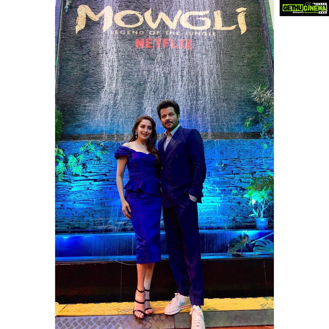 Anil Kapoor Instagram - I guess we agreed upon safeguarding the Legend #Mowgli and wearing blue to the premiere or just a happy coincidence? With the radiant @madhuridixitnene a.k.a #Nisha @netflix_in YRF - Yash Raj Films