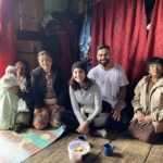 Anushka Sharma Instagram - Today , during our 8.5 km uphill trek we stopped by a small village on a mountain to pet and feed a baby calf who was born just 4 months ago . While we did that the owner of the house asked us if we were tired and wanted to have a cup of tea ? So we went in to the home of this beautiful and warm family who had absolutely no idea who we were and yet they treated us with such warmth and love . We spent some time with them chatting and drinking tea and the whole time they just know us as two tired trekkers ! Whoever knows virat and me very closely, know that both of us live for such moments of genuine , simple & pure human connection . It fills us with such joy and peace knowing that they just wanted to be kind to two random foreigners ( plus our guide ) without seeking anything in return. If this is not the true meaning of life then i dont know what is . A memory we will cherish forever 🙏💜✨