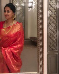 Anushka Shetty Instagram - Wearing red Kancheepuram saree by @shravankummar of Krishnadevaraya era ❤️💕 It was a beautiful wedding , best wishes to Karthikeya and Pooja, togetherness and love always forever 😍😍😘