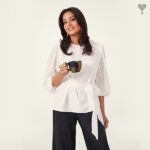 Bipasha Basu Instagram - #TheLabelLife: Channelling the #NewNormal for Monday morning with 9am essentials from @thelabellife means this chic self-tie top and the comfiest flared pants. And my morning coffee ritual of course, in my cuppa from our @starbucksindiacollab The new rules of workwear might seem hard to follow but our @thelabellife 9AM essentials are making every day dressing for me an effortless affair. Comfort meets polish in this terrific top paired with flattering bottoms for the perfect standing meet look. Head to TheLabelLife.com to shop my look and my morning must-have Starbucks cup! #TheLabelLife #ElevatedLifestyleEssentials #StyleEditor #StyleEditorNotes #9AMEssentials #MorningEssentials #MorningRitual #Shirts #Bottoms #Pants #StarbucksIndia #GetMyLook #HereIsToJoy
