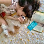 Daisy Shah Instagram - This is what my productive day looks like…. A good book to read. Lots of cuddles with my baby @theoshahofficial ‘Good vibes Only’ . . . #daisyshah #feedyoursoul #livelovelaugh #dogmomforlife