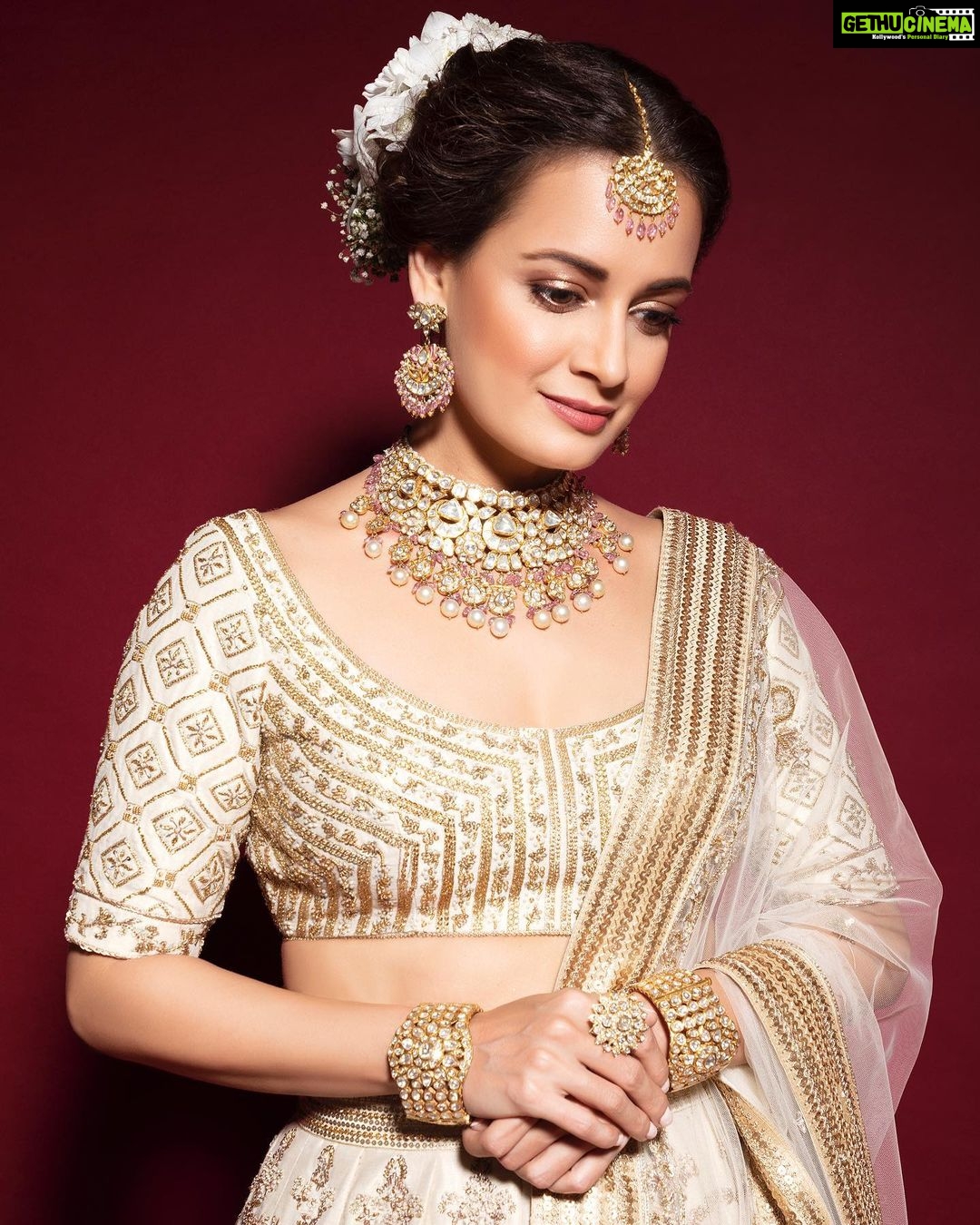 Dia Mirza Instagram - Here is a celebration of our rich Indian textile and handicraft. This was part of the collection called ‘Aarambh’ by @leffetbysanjevmarwaaha showcased at the @timesfashionweek. A Ivory modern contemporary lehenga in the brand’s signature zardozi embroidery. Inspired by Mughal floral and architectural motifs. A legacy of our culture 🤍 Jewellery by @razwada.jewels and MUH by @shraddhamishra8. Photo by @khushghulati