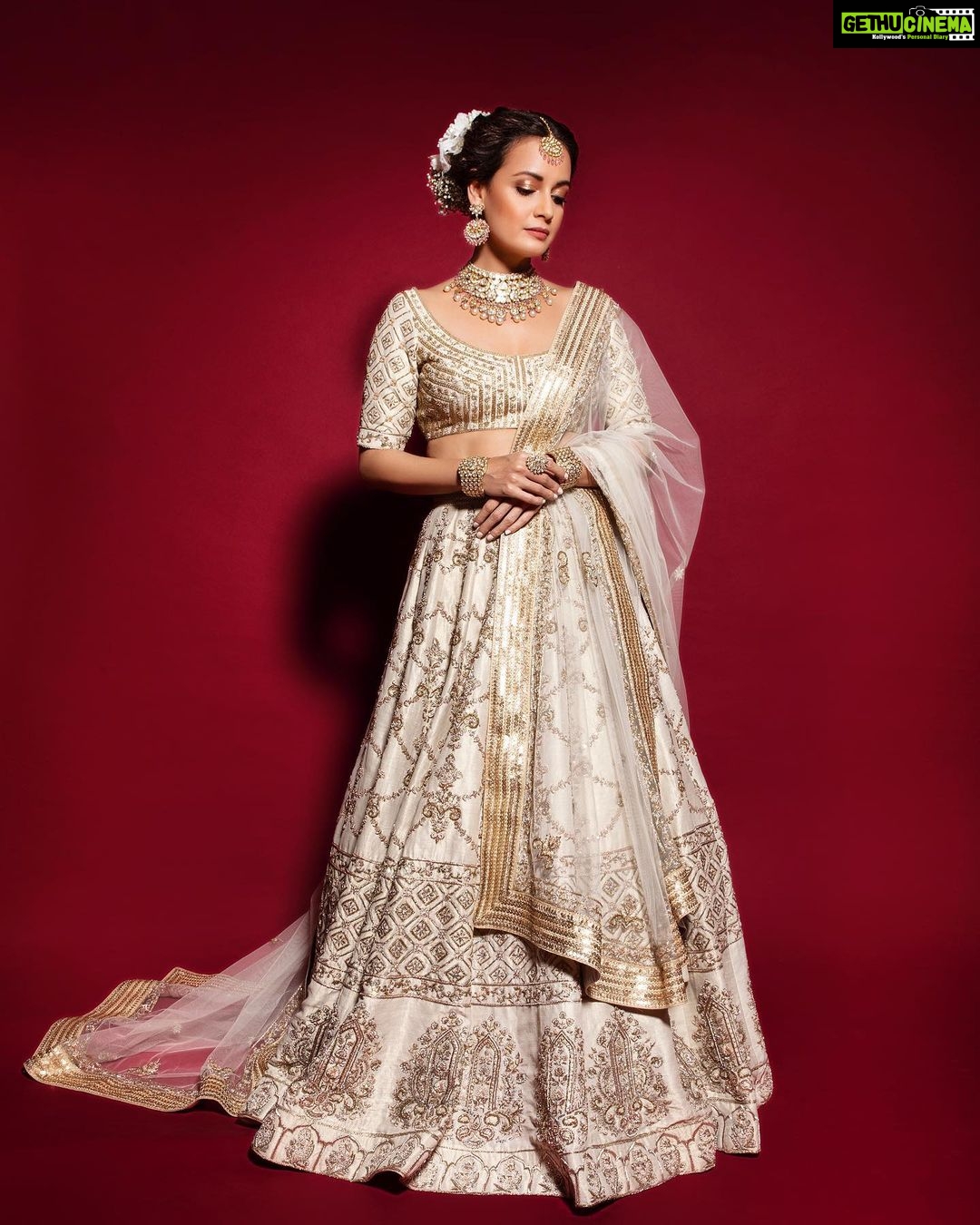 Dia Mirza Instagram - Here is a celebration of our rich Indian textile and handicraft. This was part of the collection called ‘Aarambh’ by @leffetbysanjevmarwaaha showcased at the @timesfashionweek. A Ivory modern contemporary lehenga in the brand’s signature zardozi embroidery. Inspired by Mughal floral and architectural motifs. A legacy of our culture 🤍 Jewellery by @razwada.jewels and MUH by @shraddhamishra8. Photo by @khushghulati