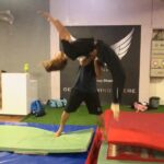 Disha Patani Instagram - Training training 💪🏽 trying to learn a back handspring and a back layout with @nadeemakhtarparkour88 @flyzonefitness_ 🌸