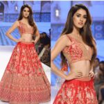 Disha Patani Instagram – @kalkifashion 🌸🌸 #KALKIAthena
Thank you @kalkifashion for the show! In love with this melon pink lehenga😍  what a graceful bridal collections 
Had a great time 🌸
#kalkishowstopper #Showtime