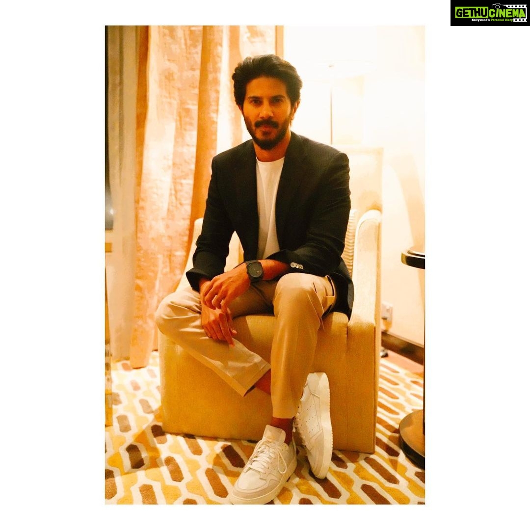Dulquer Salmaan Instagram - Let’s have a sit down ! Jacket : @boss Pants : @gatsby.aliph Shoes : @adidasoriginals Styled by : @abhilashatd Assisted by : @dipteeagarwal @shivani.sarin Hair and make up : @bijubhaskarsami @av_ratheeshcinema #poser #showinoffthemkicks #blazinitup #smartcasuals #orsomethin #shootme