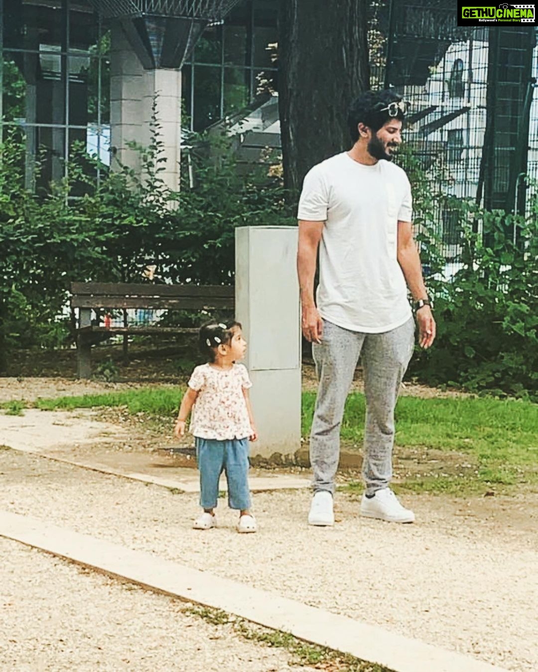Dulquer Salmaan Instagram - We even stand the same !!! đ¸ Ms Mamma #likefatherlikedaughter #twinningwithM #pigtails #floppyhair #minime #playarea #or #pyay #ayea #herfavthing #outdoorsy #parks #slides #swings #merrygorounds #dQnAnM #heart #vacay #budapest