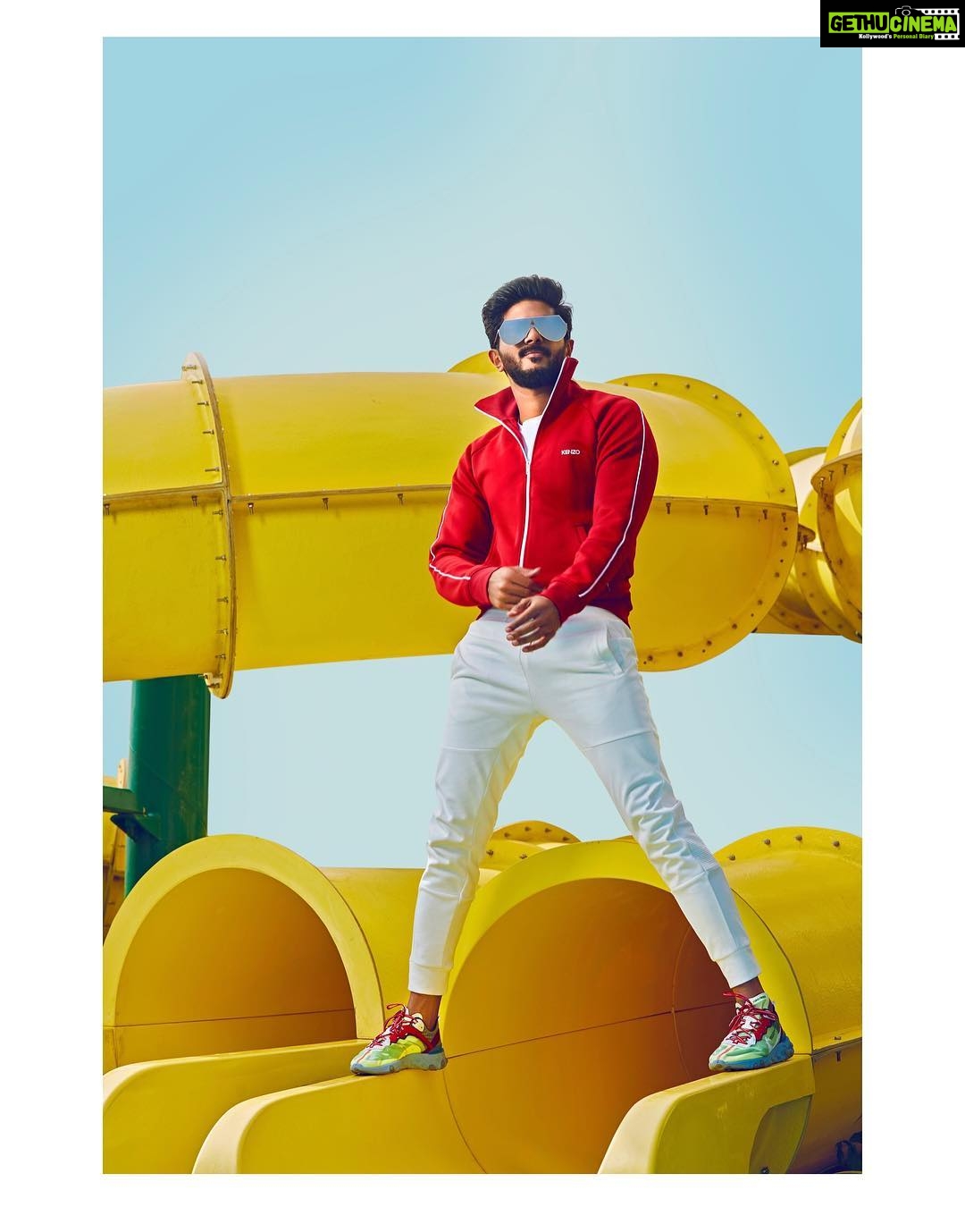 Dulquer Salmaan Instagram - Some Pop for the gram ! #posingonwaterslides #balancingprecariously #slipperyslides #shootlife #thatbeardowithalenso #raidingmywardrobe #myboyshootingme Photoshoot: @vanithaofficial Photography : @shanishaki Retouch : Jemini Ghosh Photography Assitants : Sreeraj, Ajith Varghese, Justin & Girilal Location courtesy : @grandhyattkochi Clothes & Shoes : My Own 🙄