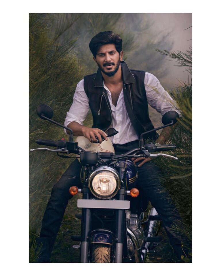 Dulquer Salmaan Instagram - The recent shoot we did for @vanithaofficial ! Blame my pained expression on @Shanishaki and his time taking 🤣 #photoshoot #afterages #thatbeardowithalenso #makingmemakestrangefaces #tryingintense #butfailing #butsooooofun #letsdomoreofthis #bikerboy #knightriders #myboyshootingme Photography & Styling : the one and only @shanishaki Retouch : Jemini Ghosh Photography assistants : Sreeraj, Ajith Varghese, Justin & Girilal Bike courtesy : Classic Motors Clothes : Underground Calicut Waiting in the sidelines : @jazz_superstar @gregg_dawg @jom.v