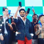 Dulquer Salmaan Instagram - Super excited to launch the Oppo F11Pro ! It boasts of a 48 megapixel rear camera and a total of 3 cameras. Brilliant for low light photography. Also the rising front cam is super cool. Great for selfies ! Lots of love to Oppo, a big congrats on celebrating 4 years in Kerala. And to all the Oppo sales and distribution teams that were present for giving me so much love. Thank you @osmanabdulrazak for my casual yet classy ensemble ! #OppoF11Pro #launchevent #beforehespeakhissuitbespoke