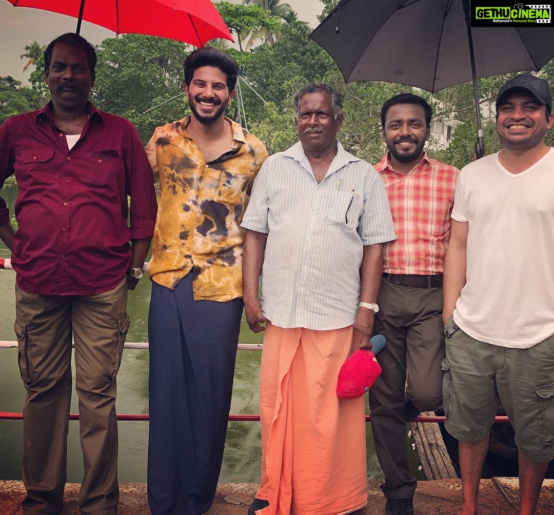 Dulquer Salmaan Instagram - Utterly thrilled to restart #OruYemandanPremaKatha !! But it’s such a fun happy and hilarious set that I feel like no time has passed between scheds ! Of course seen in the pic are the hilarious and heartwarming Salim Ettan, my machan Saubi and the wonderful Vishnu and Bibin ! If you’re all wondering who the other fine gent right next to me is, he’s one of the boatmen helping us with shoot ! And I kid you not, his name is Sputnik ! How epic a name is that ? He was born a year after Russia launched Sputnik 1 into orbit in ‘57. So his folks named him Sputnik. Was the highlight of my day ! #epicday #epicnames #epicgents #epicweather #epicstate #entekeralam