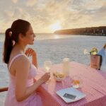 Kajal Aggarwal Instagram - Sipping some wine by the beach, Enjoying the beautiful sunset, Relaxing by the magnanimous ocean... - True happiness!